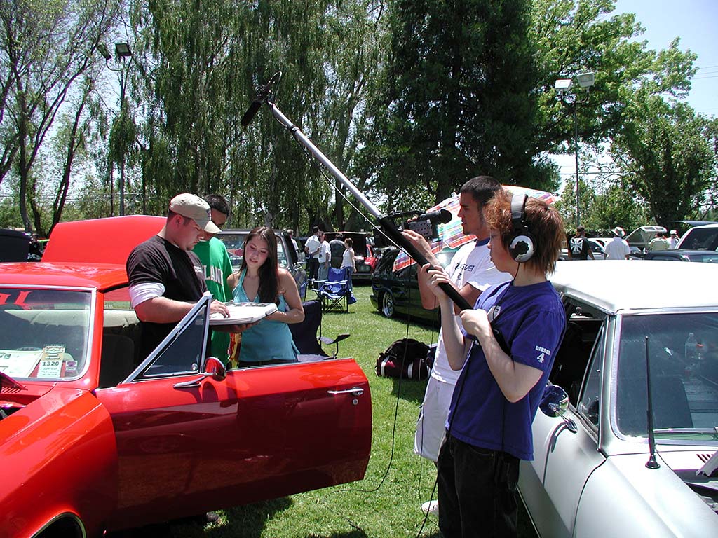 The youth crew filming outdoors